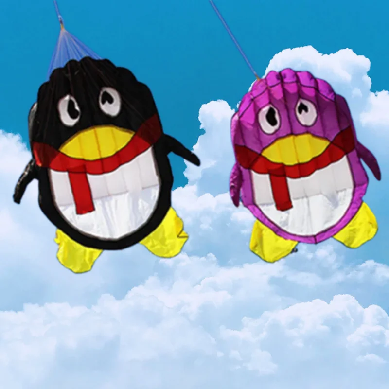 Envío Gratis, pipas de pingüino, juguetes voladores para niños, cometa de dibujos animados, juegos inflables su maymunu atan tabanca lenkdrachen al aire libre