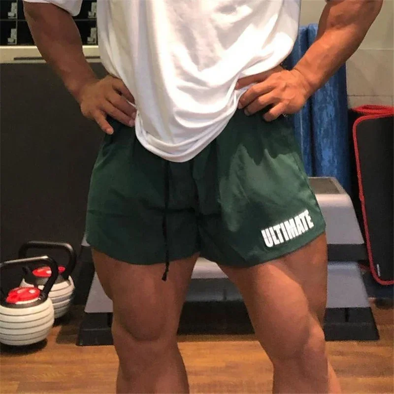 

Мужские спортивные шорты для фитнеса, мужские повседневные быстросохнущие брюки три четверти, дышащие эластичные мышечные шорты для приседаний, большие размеры M-5XL