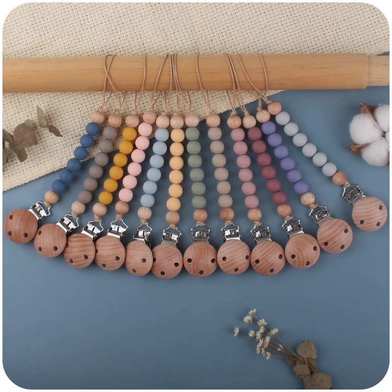 

New Style Infant and Toddler Product Wooden Pacifier Clip Soothes Baby Silicon Bead Teether and Grind Teeth Chewing Gum Toy