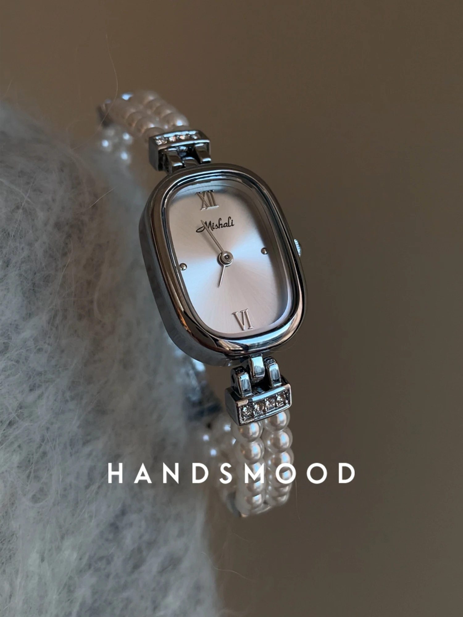 

Elegant And GentleThisOvalShapedWomen'S Wristwatch With A Pearl Strap Is A Sophisticated BirthdayGift And A Stylish Quartz Watch