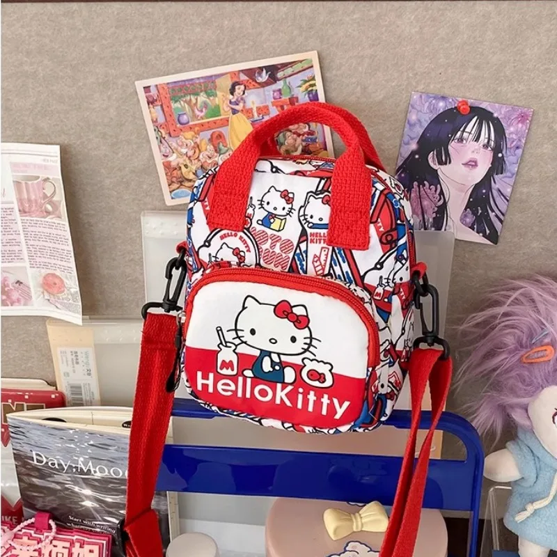 MBTI Hello Kitty torba na ramię damska mała styl japoński moda nadruk kreskówkowy torba Crossbody nylonowa śliczna damska torebka na monety