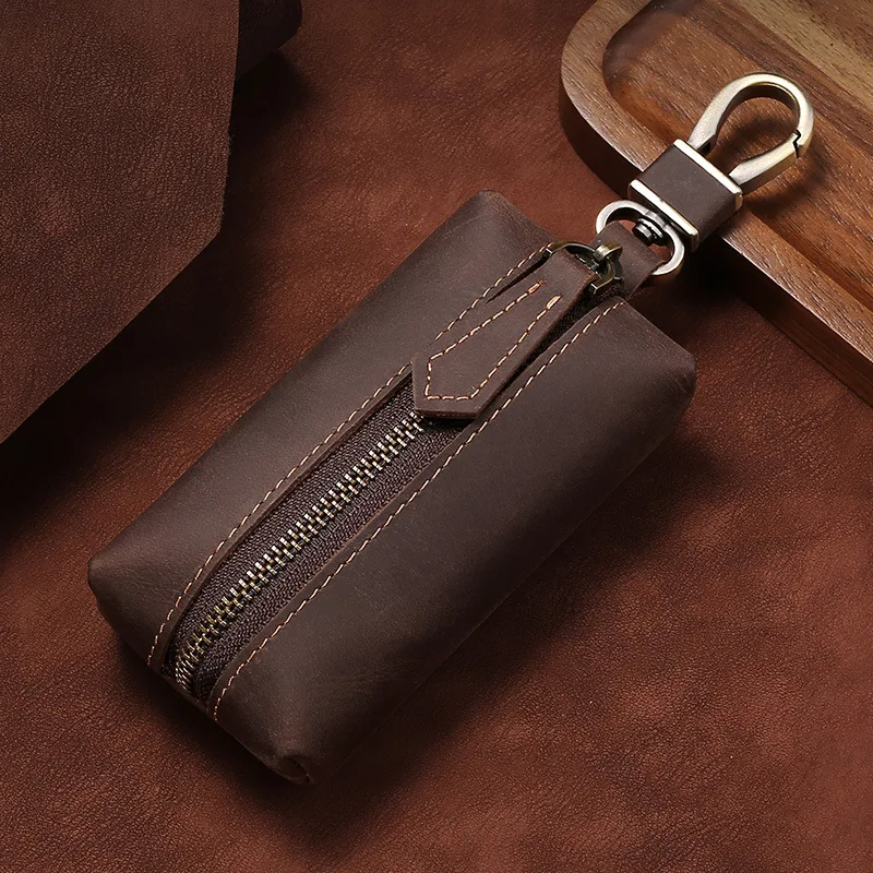 Bolso Vintage de cuero genuino para llaves para hombre, Mini monedero suave con cremallera, organizador portátil para llaves de coche, monedero Unisex