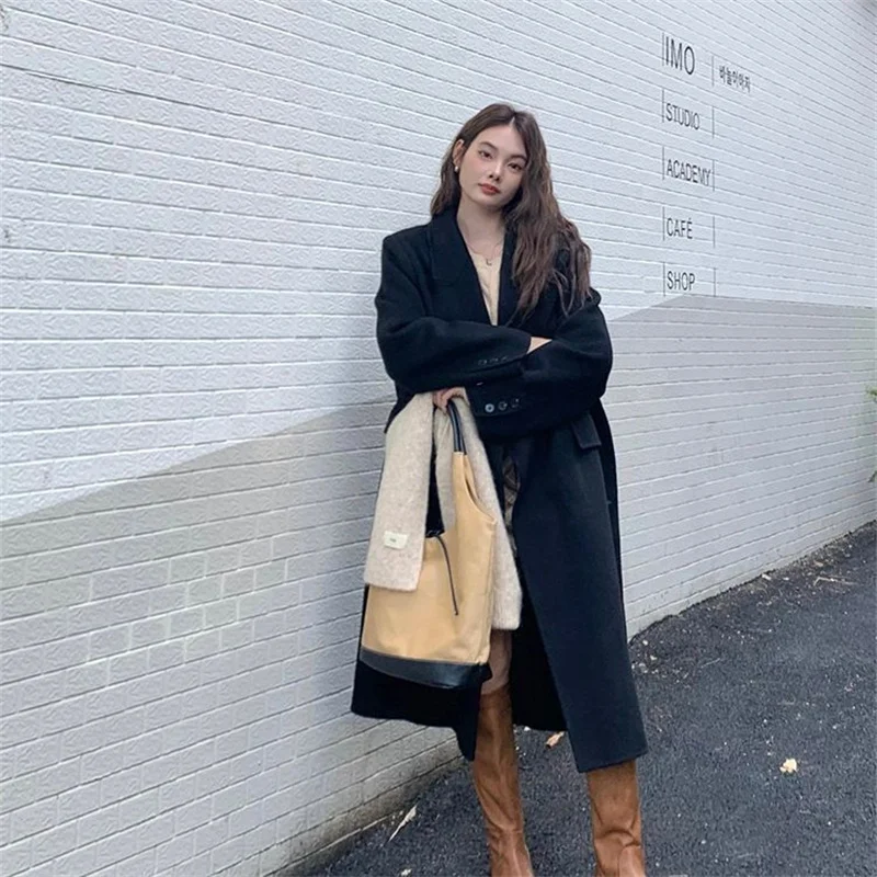 2026 Cappotto di lana con petto abbassato da donna autunno 2026 Moda stile sciolto Abbigliamento invernale da donna Cappotti lunghi Top