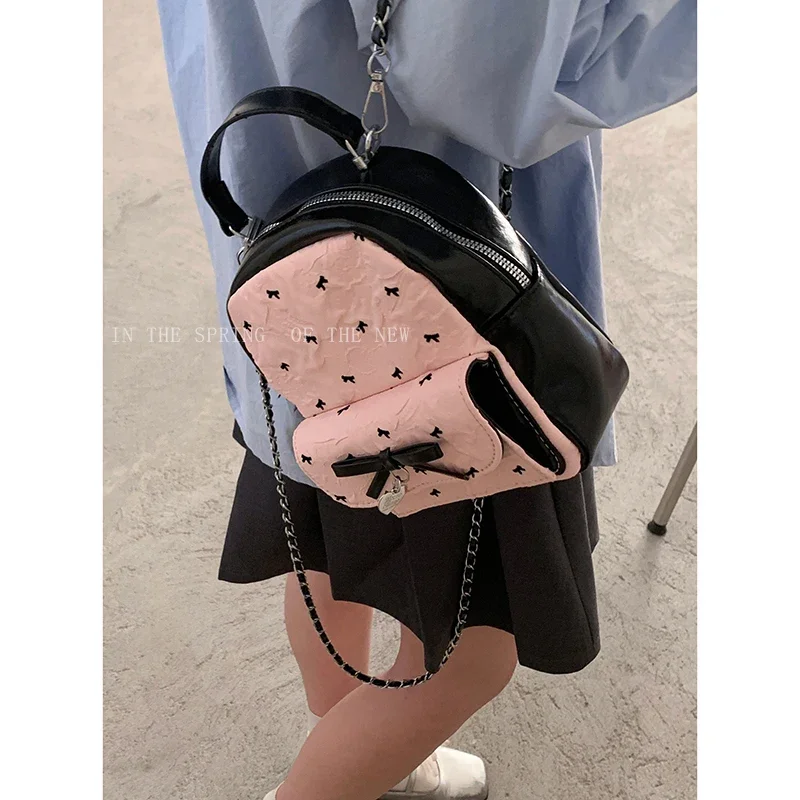 

2025 New Polka Dot Bow Backpack for Women Versatile Handheld Travel Bag Fashionable Cute Chain Backpacks