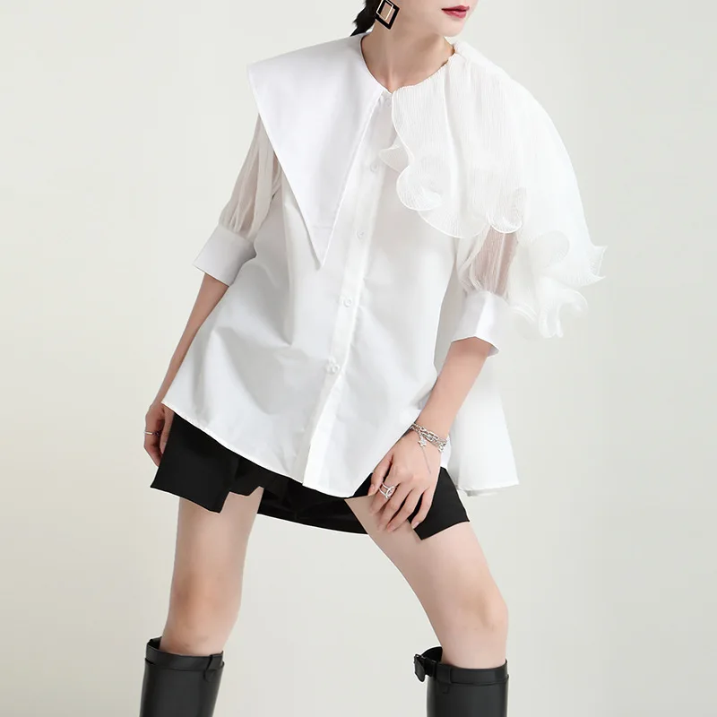 New for summer, it's rumled with ruffles and irregular panels, short-sleeved shirt with belt top