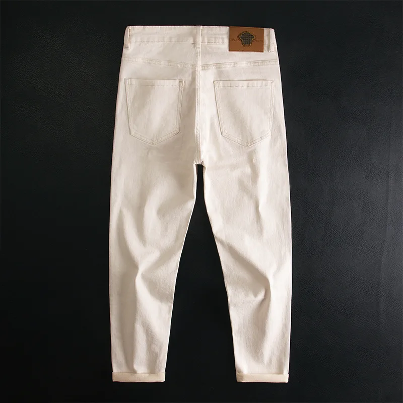 Gebroken witte jeans voor heren, herfst nieuwe trendy stijl, knap en veelzijdig, casual eenvoudige high-end slim fit broek met rechte pijpen