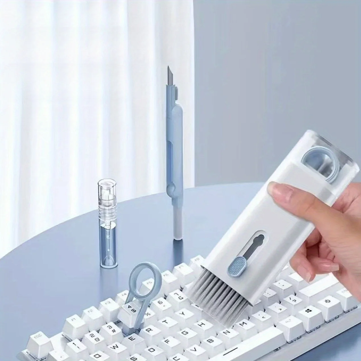 

1pc 7-in-1 multifunctional computer keyboard cleaning brush set, for cleaning wireless earphones, dusting phone screens, keyboard dusting tools, a must-have cleaning tool for electronic devices
