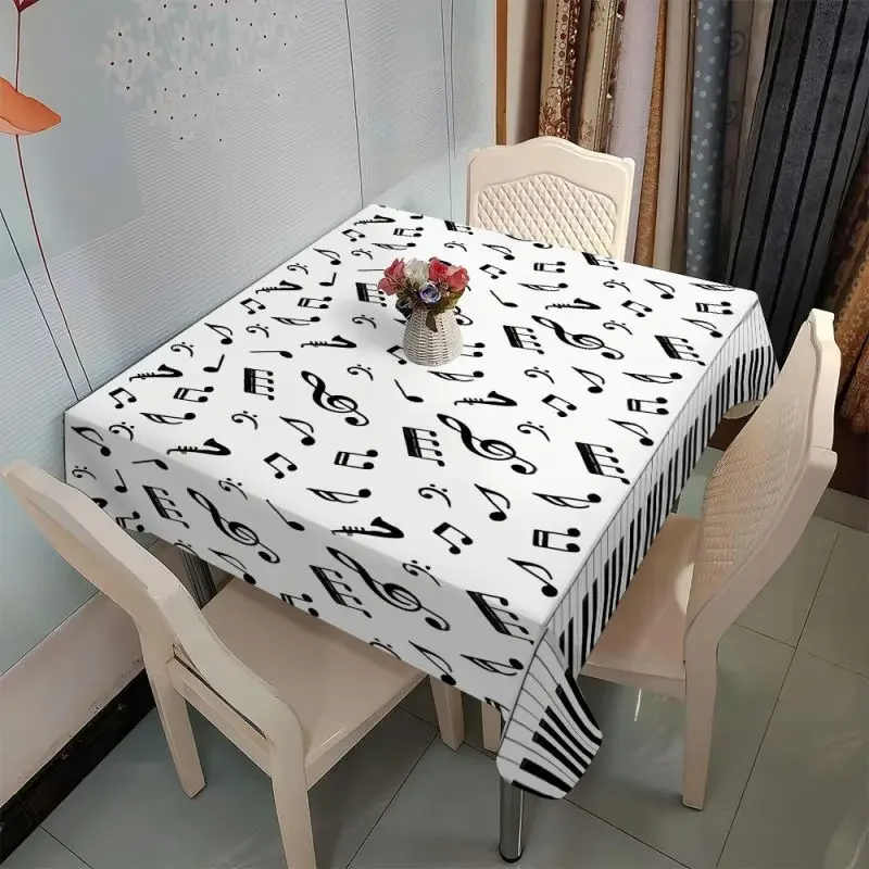 One polyester tablecloth, with a simple style and symmetrical lace edges, featuring a colorful print of musical notes.