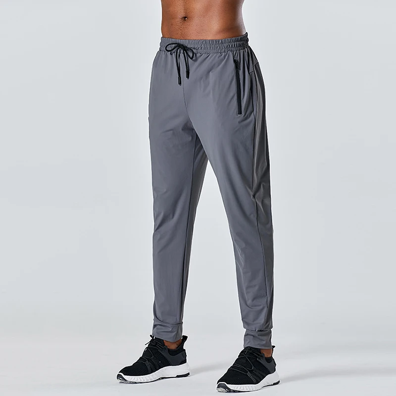 Yoga sports cuffed pants with brand logo men loose sweatpants elastic drawstring waist trousers zipper pockets niners slacks