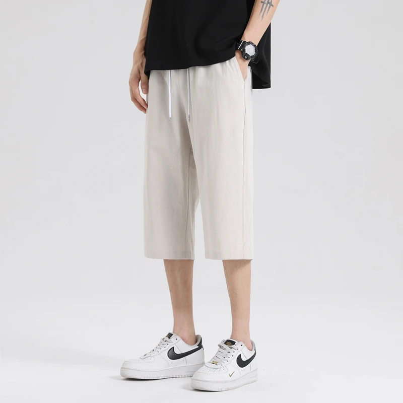 

2024 Summer Men's Comfortable Breathable Linen Pants Fashion Sports High Street Seven Quarter Pants Loose Large Hombre Pants