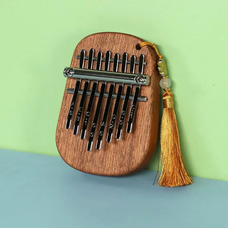 Mini Kalimba 8 Tasten Daumen Klavier tragbare Musik tastatur Musik instrumente mit Lanyard exquisite Geschenkset für Kinder Weihnachten