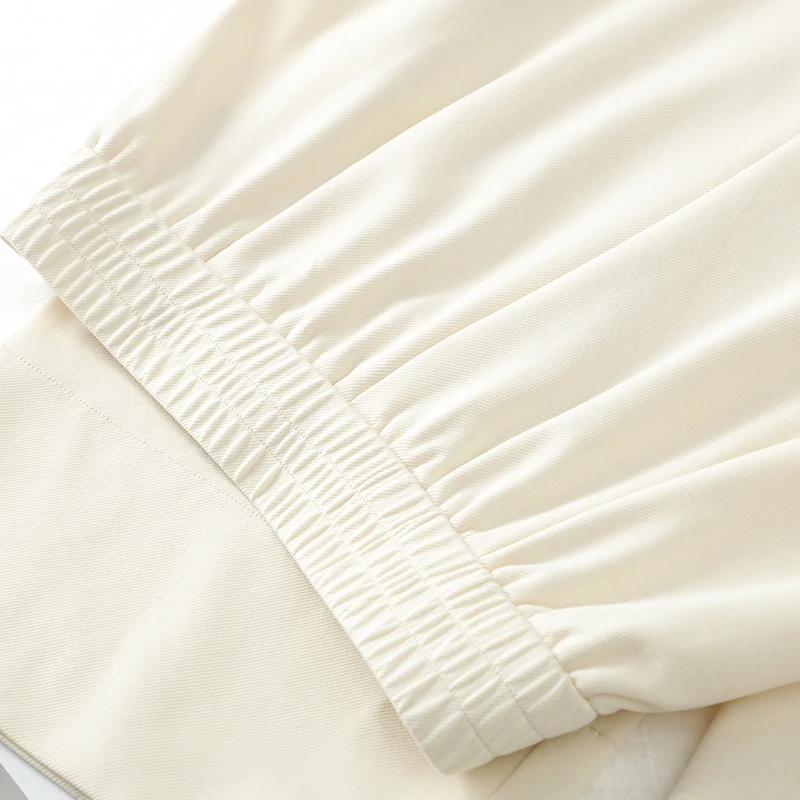 Pantaloni casual a gamba larga da donna a vita alta 2025 primavera nuovo stile pantaloni larghi e dimagranti dal design da appendere alla strada