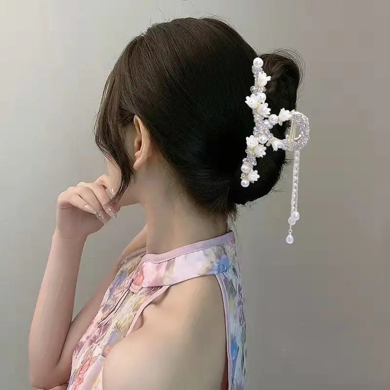 Gu Feng Ling Lan Hua Butterfly Tassel Grab Clip New Product Pan Hair Showcase Elegance High End Luxury Decoration