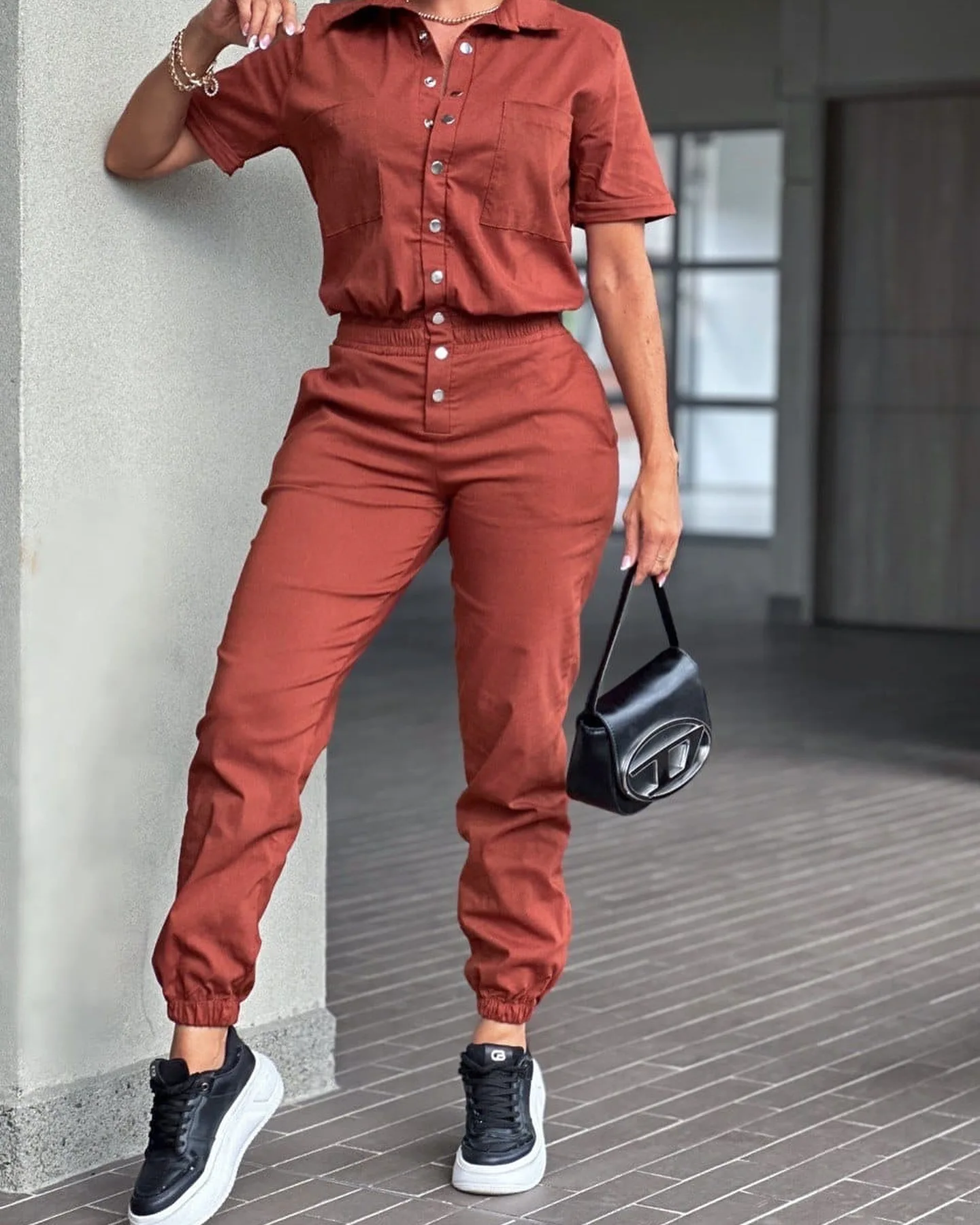 

Fashion Solid Color Tight Lapel Short-sleeved Jumpsuit Women 2025 Summer Casual Button Top Pocket Jumpsuit For Women