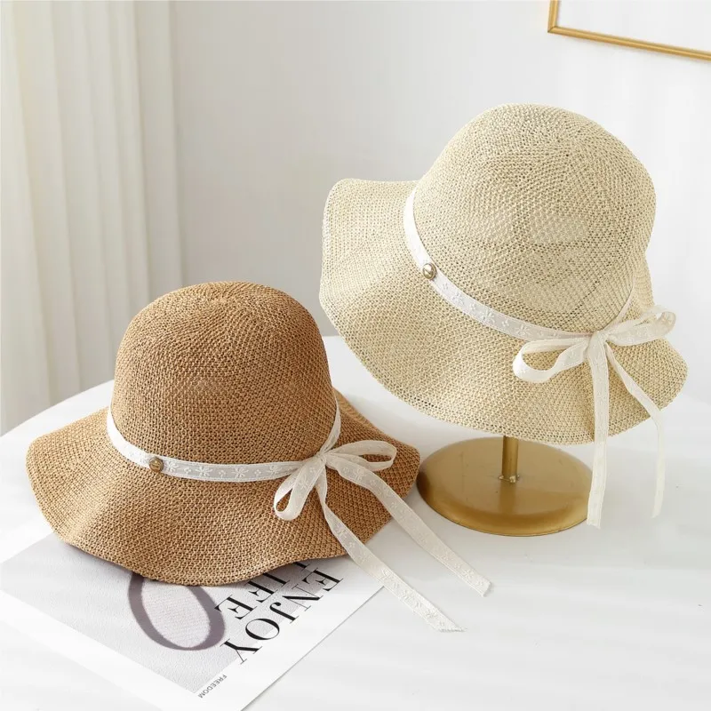 Ladies' outdoor hat with metal label fisherman's fashionable and versatile light knitted