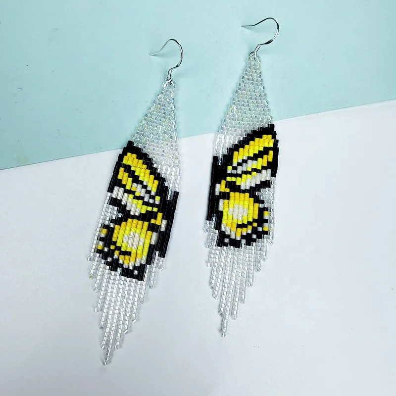 

Beaded earrings Tassel Butterfly Symmetry Originality Design Hand knitting Bohemia Alloy Tide Simple Rice bead earrings