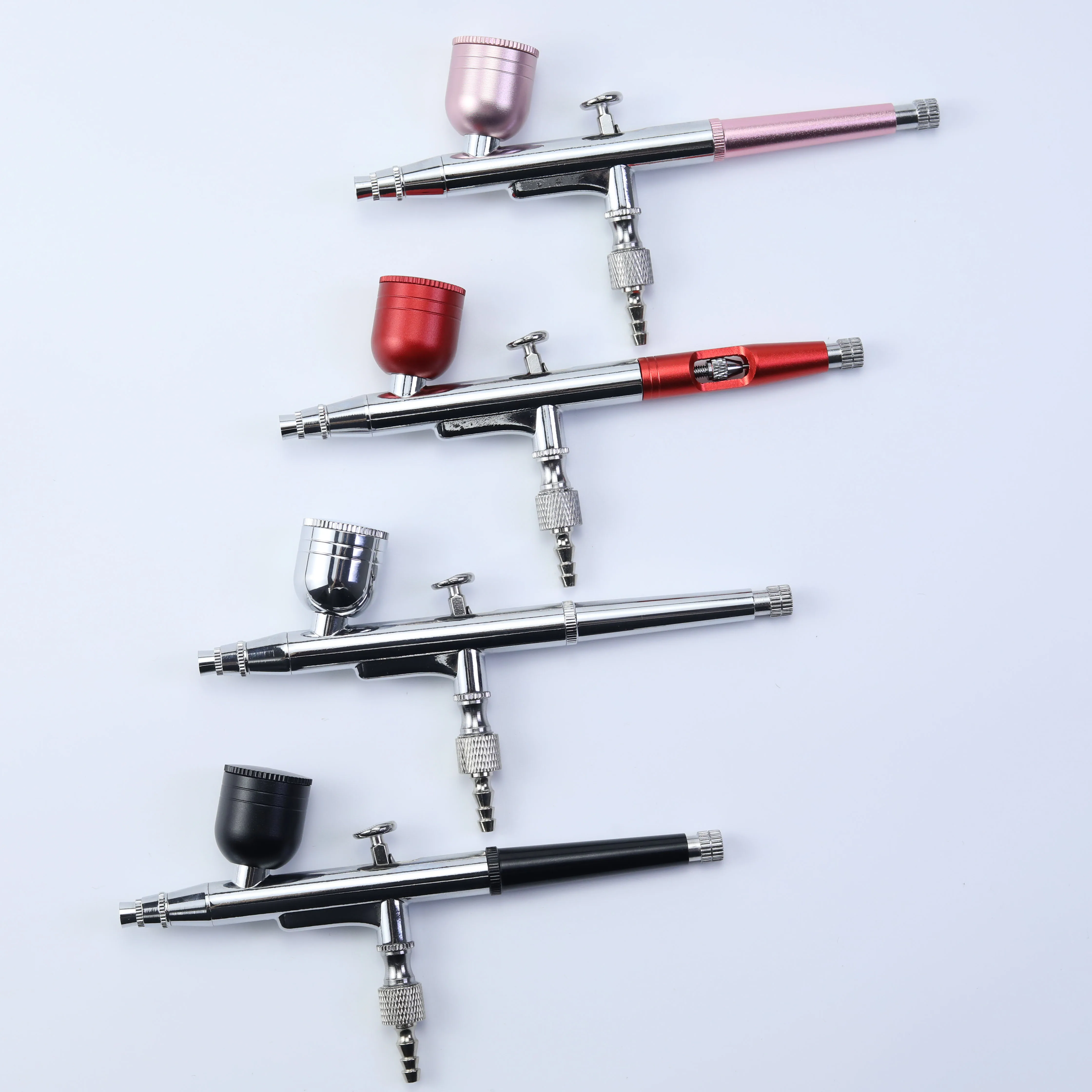 Precision dual-action airbrush with 0.3mm nozzle and needle, suitable for cake decorating, model art and tattoo painting.