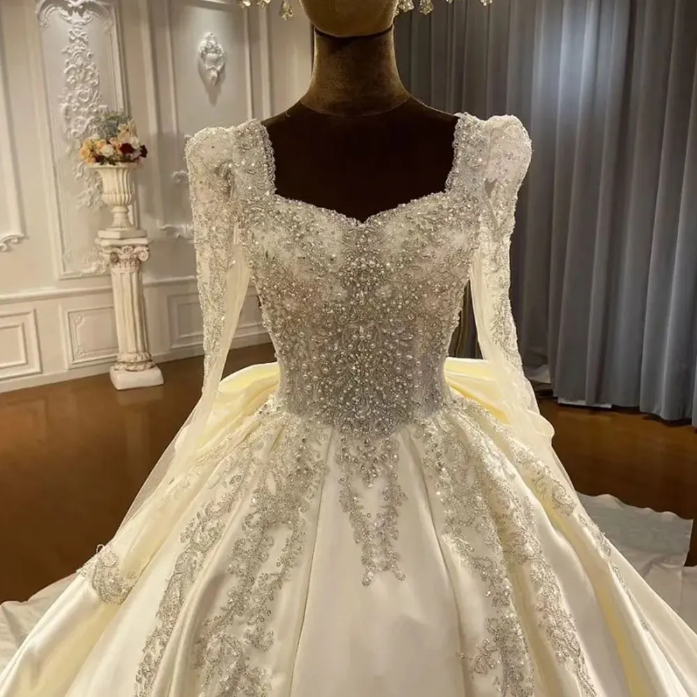 Vestidos de novia de satén de lujo con espalda, lazo grande, encaje, cuentas de cristal, escote Corazón, mangas largas, largo hasta el suelo, vestidos de baile