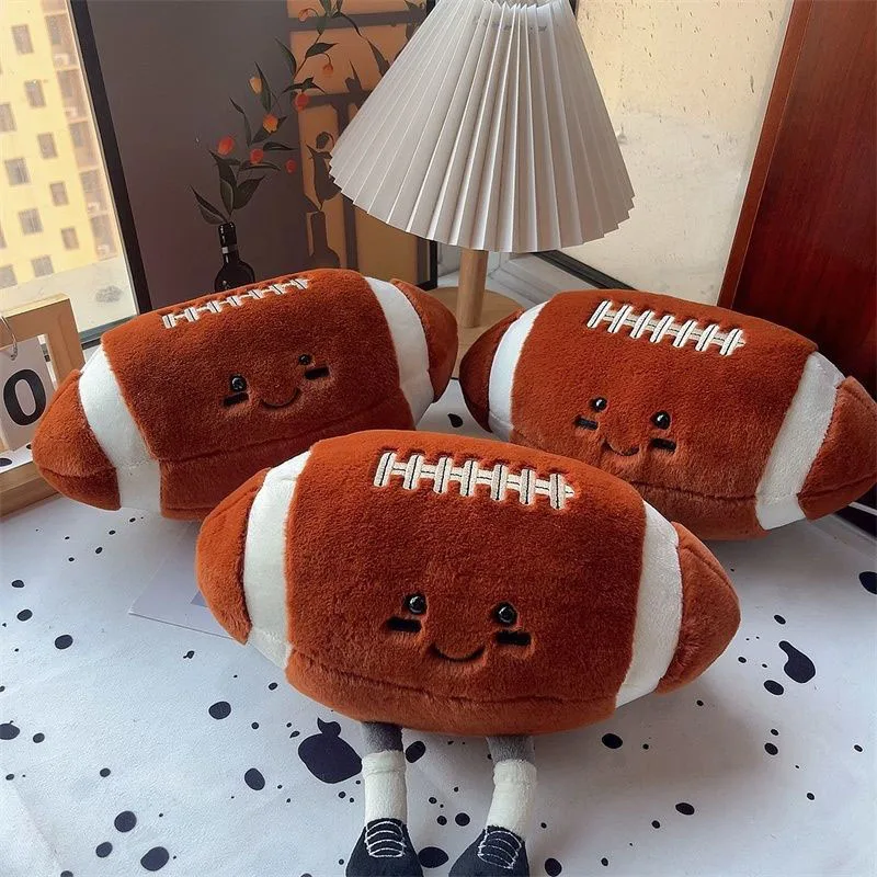 

Cute Anthropomorphic American Football Plush Toy Soft Stuffed Rugby Ball Smiling Football Plushie with Legs Gift for Sports Fans