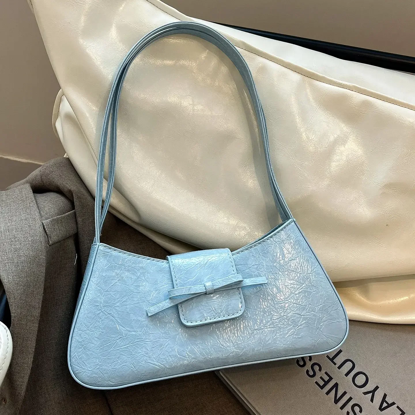 

Korean Version Armpit Small Square Bag For Women 2025 New Fashionable Commuting Shoulder Bag Popular Versatile Bow Handbag