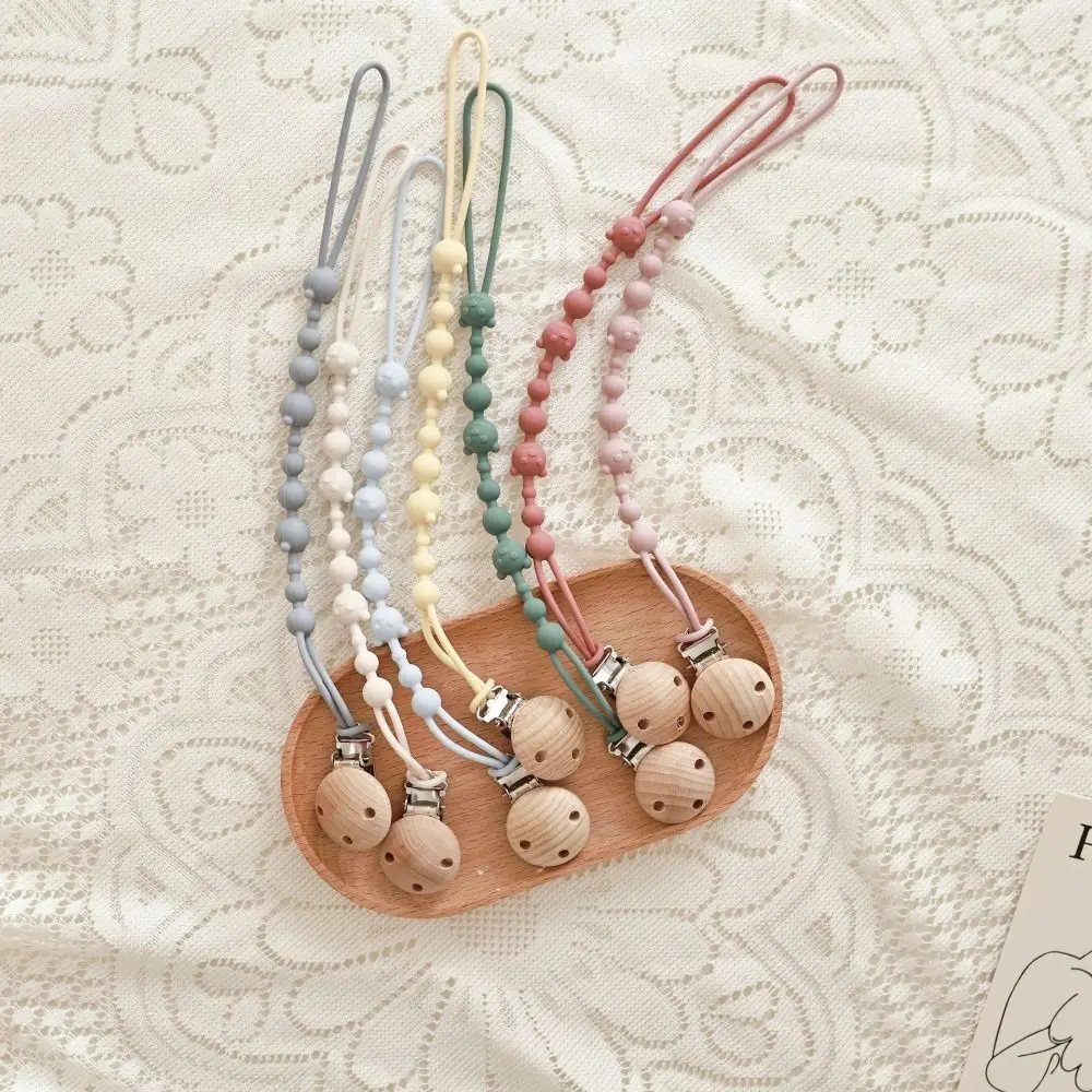 

Держатели для детских пустышек из пищевого силикона: легкие, цельные, с защитой от падения, прочные, с прорезывателем для зубов