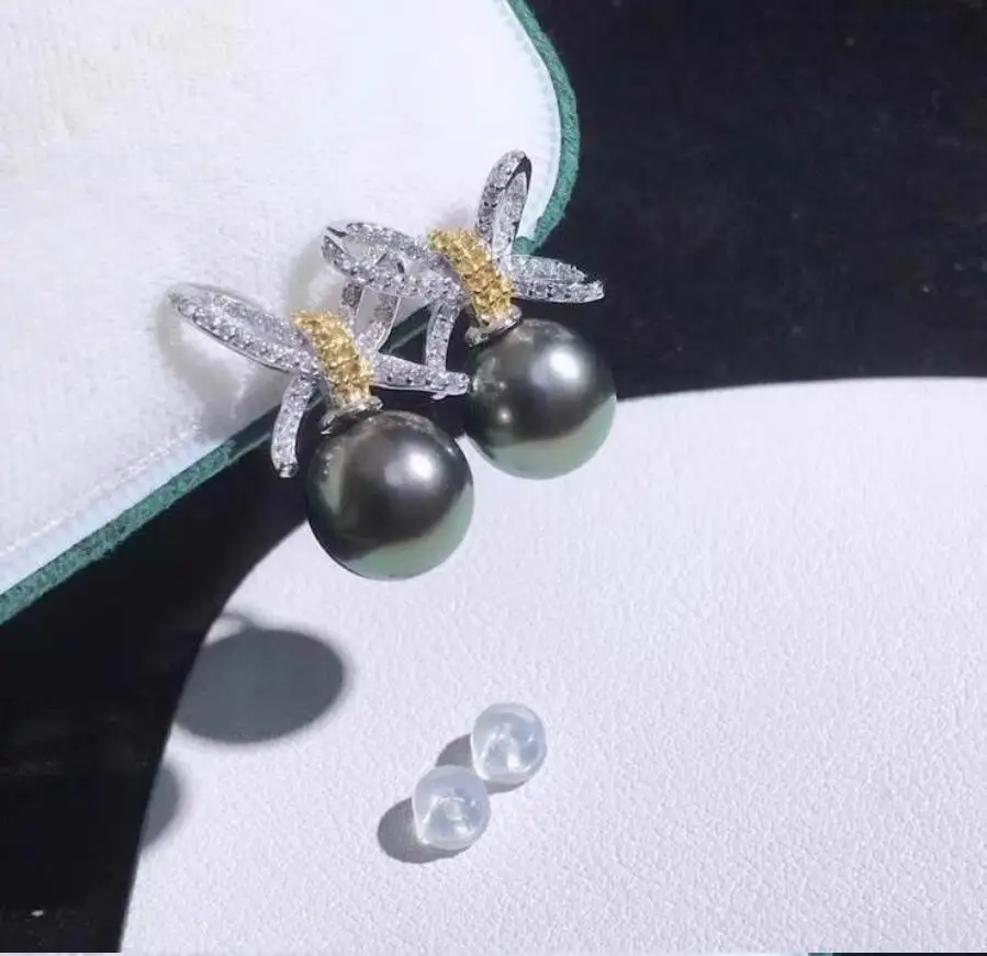 

потрясающая пара натуральных черных идеальных круглых серег с жемчугом Южных морей диаметром 10–11 мм, 925-х годов.