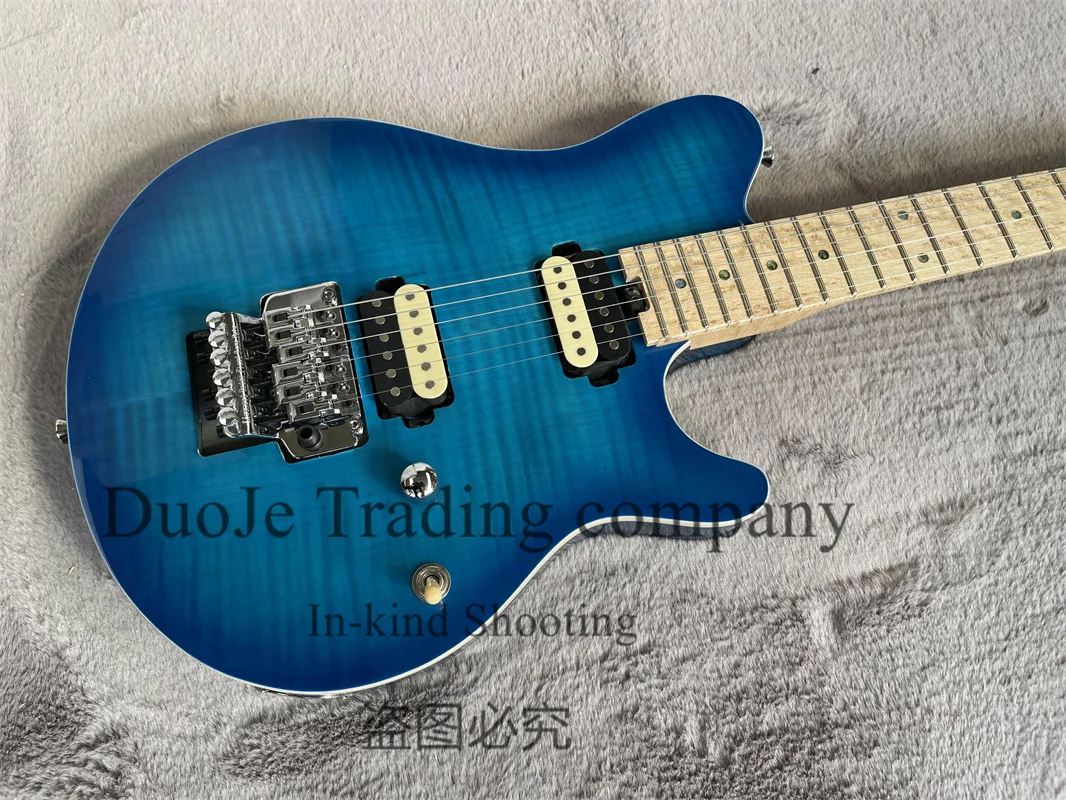 Blue Electric Guitar Man body Squilted maple Top Bird's eye Fretboard And neck Tremolo bridge Zebra pickup support customization