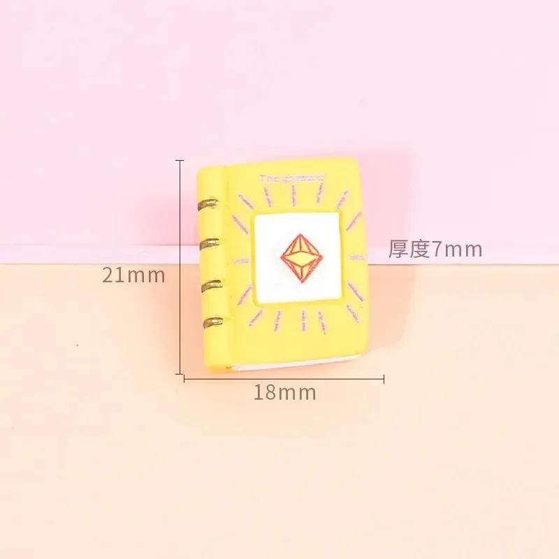 อุปกรณ์ตกแต่งเรซิ่นรูปหนังสือเวทมนตร์ 9 ชิ้น, อุปกรณ์ตกแต่งกาวครีม, ของตกแต่งงานฝีมือ DIY ขนาดเล็ก, อุปกรณ์ตกแต่งบ้านตุ๊กตา