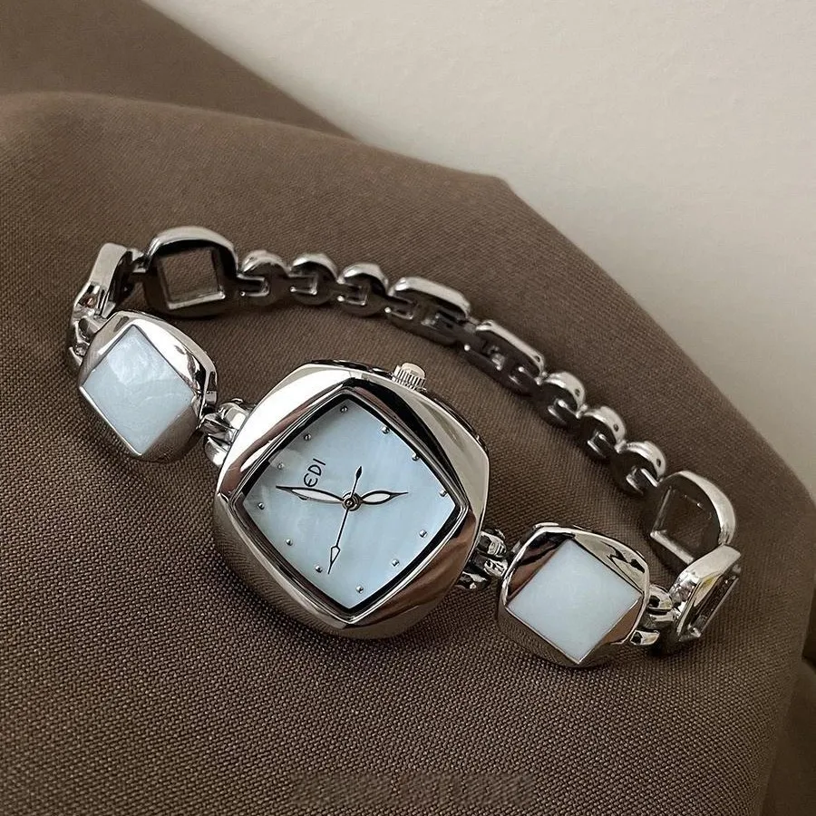 Elegant and sophisticated women's watch with mother-of-pearl design, polygonal shape, high-end feel, suitable for students.