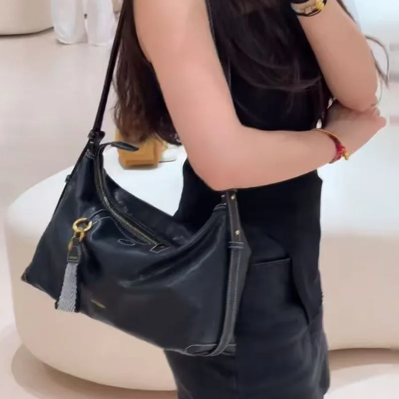 

2026 New Songmont Fashionable new large capacity travel bag high-end and versatile crossbody computer bag