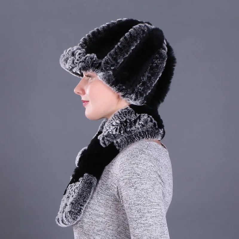 

A middle-aged woman's old baseball cap for warmth and ear knitted mother's hat scarf