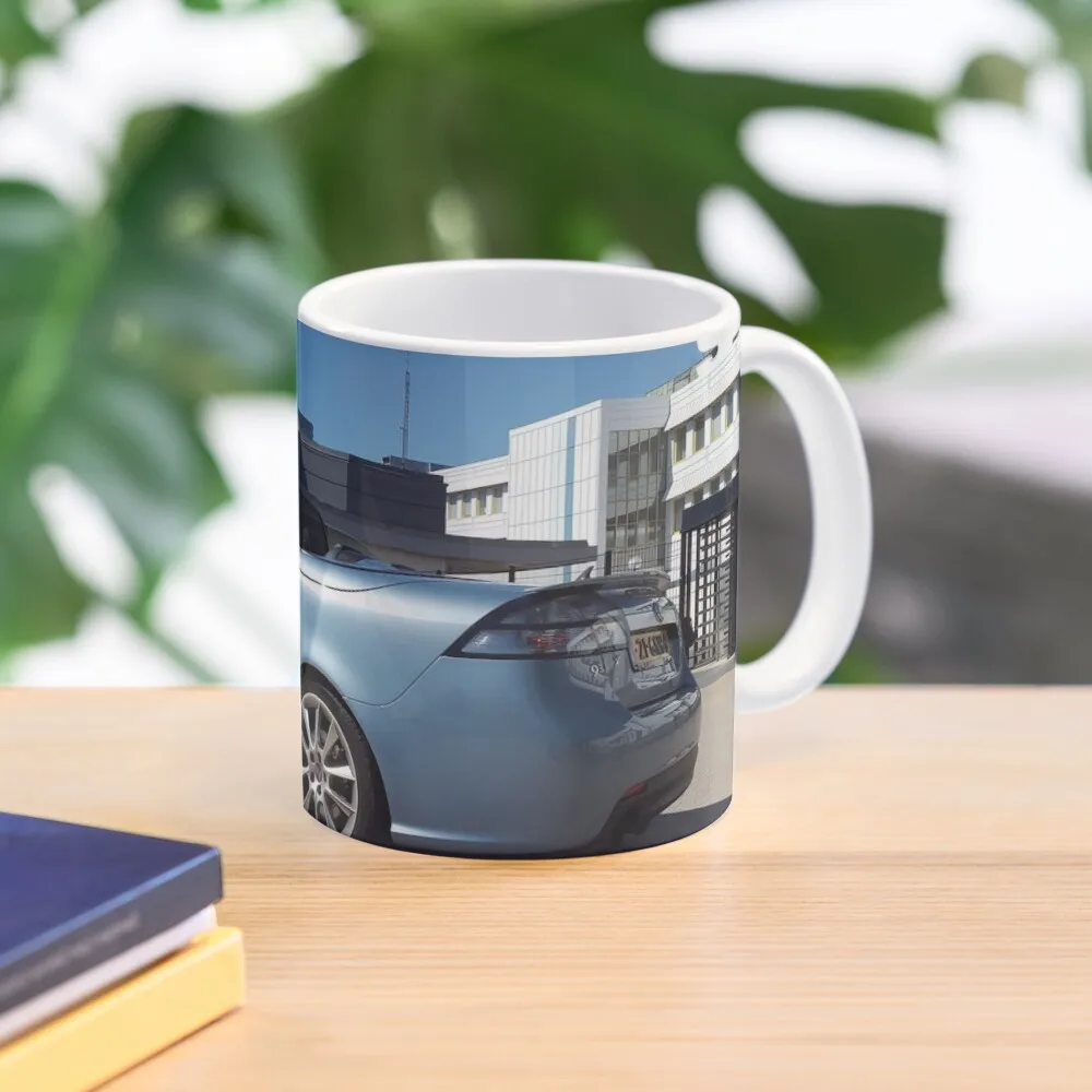 

Saab 9-3 convertible at the factory gate in Trollhattan. Coffee Mug Funny Coffee Cups