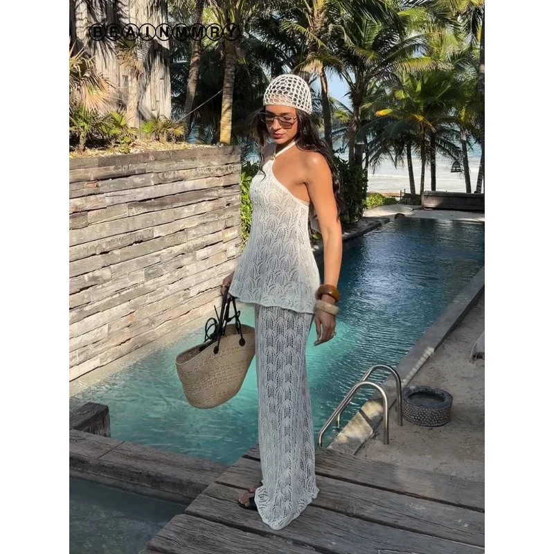 

Женский повседневный комплект: топ с вырезами и сеткой, открытые плечи, без спинки, на бретелях, прямые брюки. Летний комплект для отпуска 2026