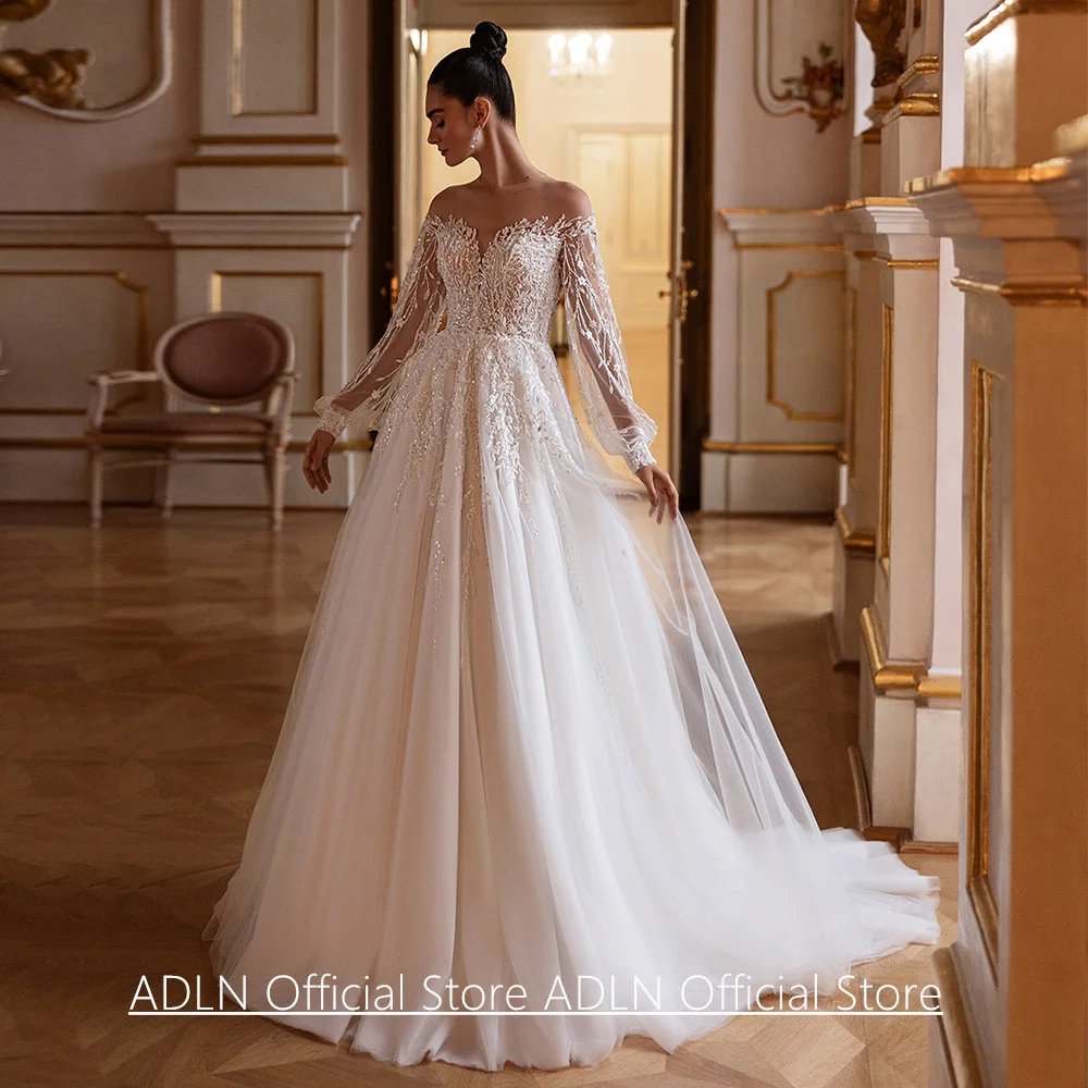 Abito da sposa Abiti da sposa Personalizzato maniche lunghe trasparenti scintillanti perline applique Sweep Train Abito da sposa per la sposa