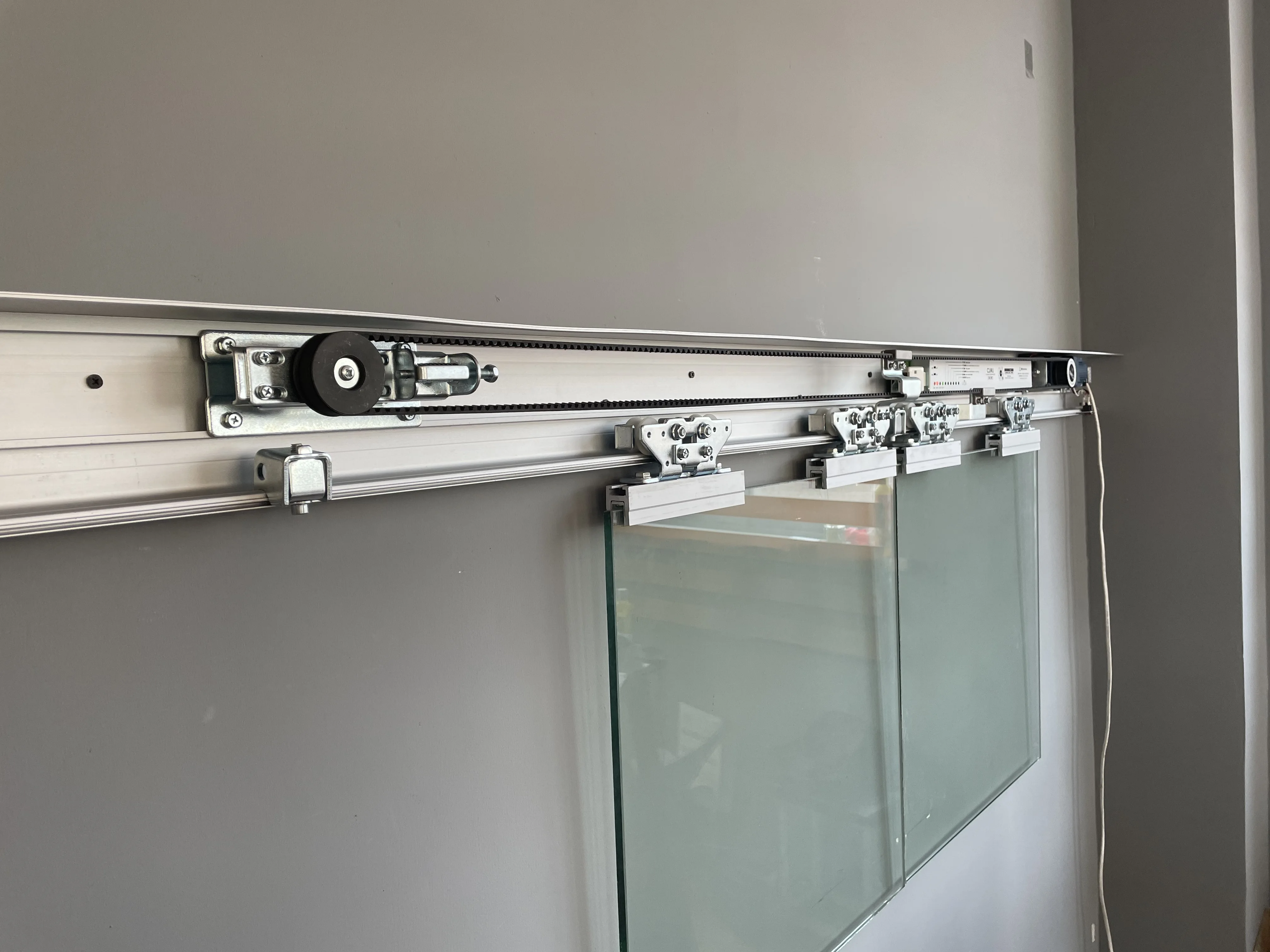 

A1 300KGS Model Automatic Glass Door Motor System 24V Dc Brushless 120W Remote Automatic Temper Glass Door Opener Slide