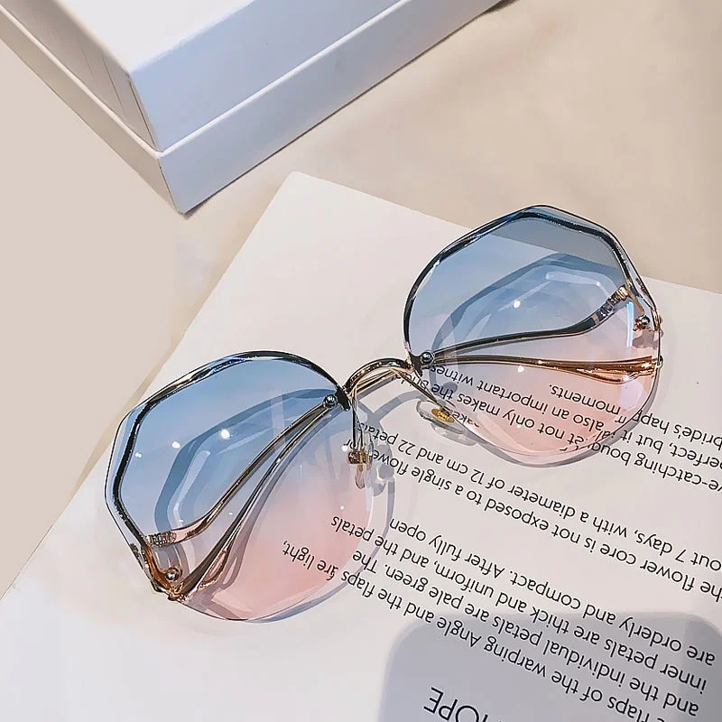 

New style ocean gradient sunglasses for women, fashionable without frames, with beveled edges Car Sunglasses 1211