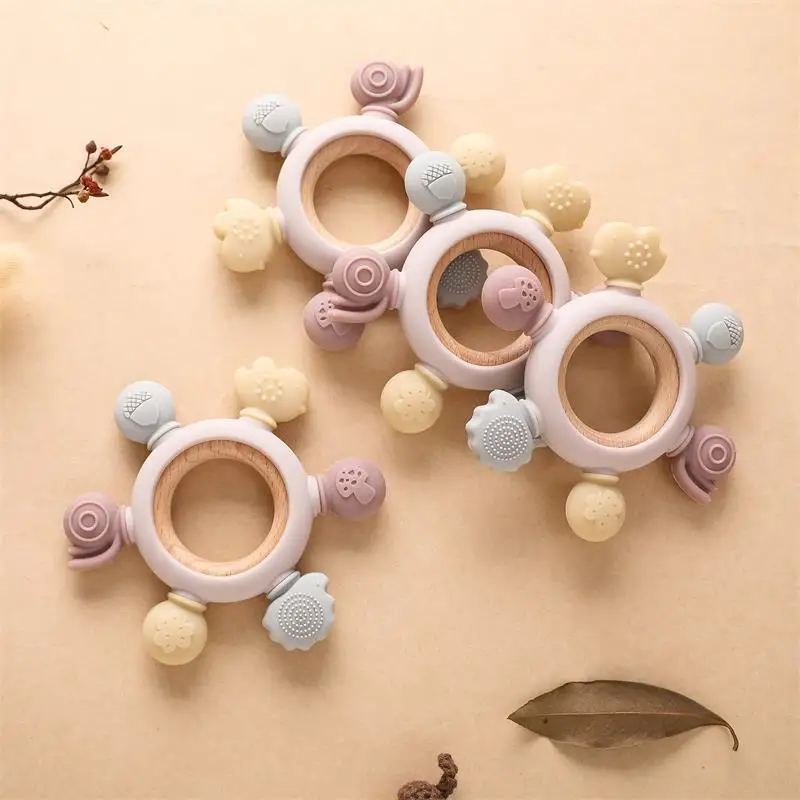 

Food Grade Baby Silicone Teether Ring Toy Infant Care Kid Teething Gift Rudder Shape Wood Ball Sound Cognitive Set