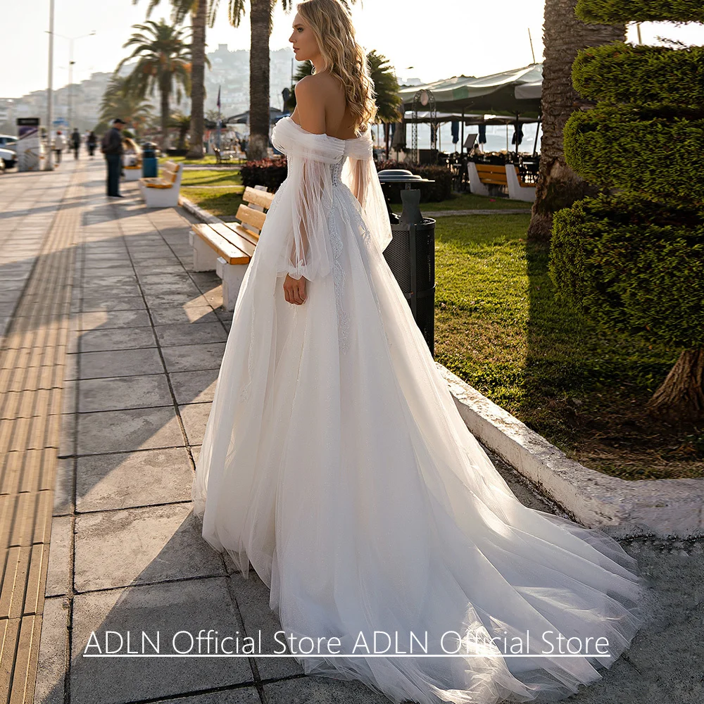 Prinses trouwjurken voor de bruid Op maat gemaakte afneembare pofmouwen Sweetheart kralen appliqué sweep trein bruidsjurk