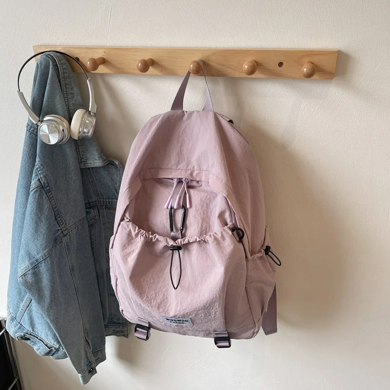 حقائب ظهر عصرية للنساء والطلاب الجامعيين حقائب مدرسية ذات سعة كبيرة من النايلون حقائب كتف خفيفة الوزن كاجوال للسفر Mochilas