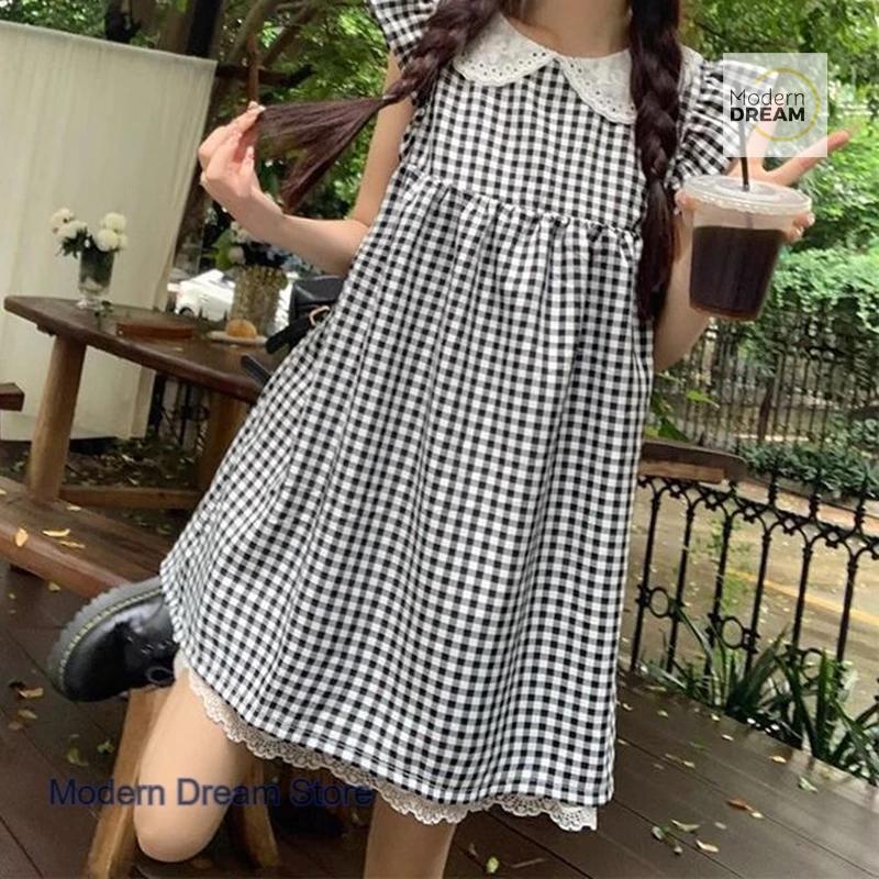 

Korean black-and-white plaid flying sleeve college wind dress female summer new lace stitching loose slim casual A-line skirt