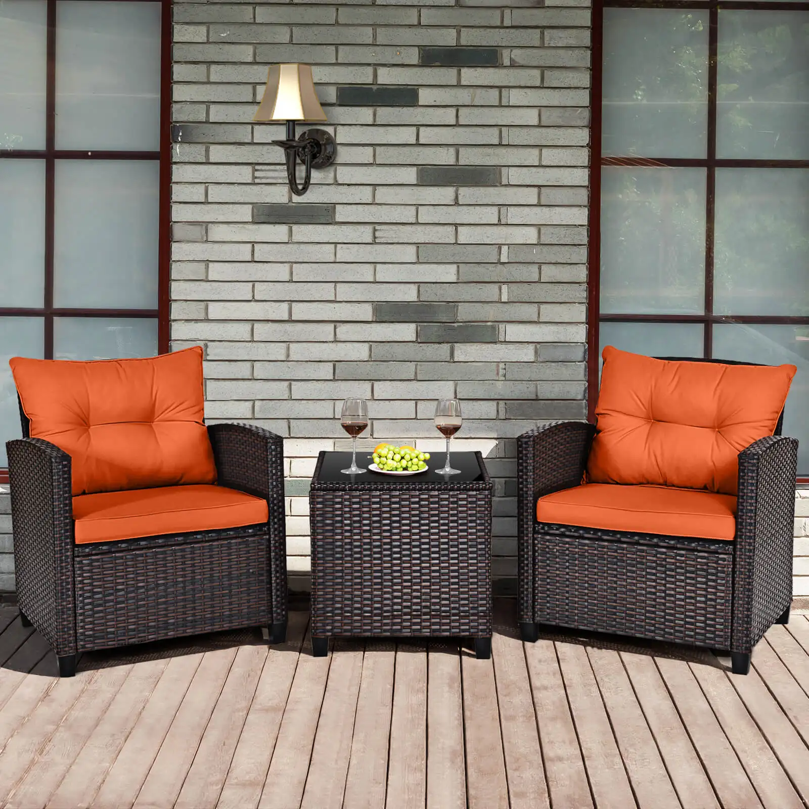 3 PCS Outdoor Rattan Furniture Set with chairs, table, and orange cushions