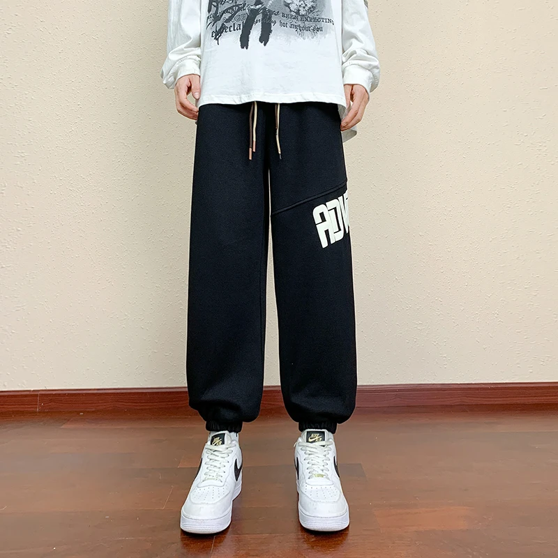 กางเกงขายาวทรงตรง น้ำหนักเบา ระบายอากาศดี สไตล์ลำลอง แฟชั่นใหม่ สำหรับผู้ชายและผู้หญิง เหมาะกับฤดูใบไม้ร่วง เอวยางยืด มีเชือกผูก