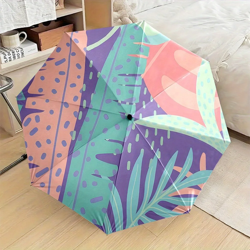 

Folding Umbrella The umbrella features abstract tropical leaves and shapes in shades of purple, green, and peach. Fits Travel,