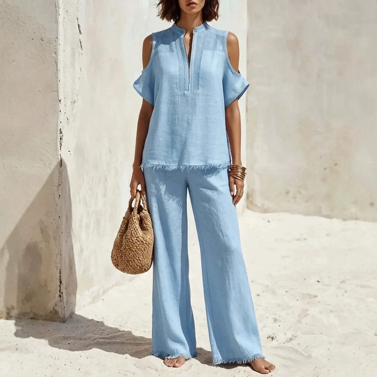 

New stylish elegant off-shoulder short-sleeve top and long pants set for women made of flowy cotton and linen