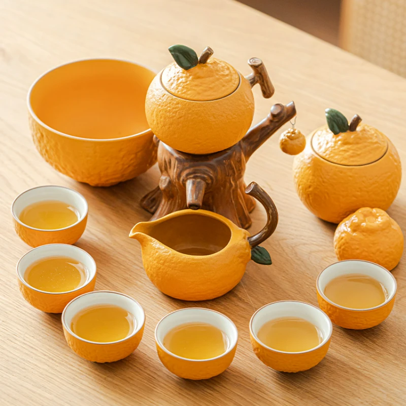 

Новый чайный сервиз Kongfu, домашний светильник, роскошные высококачественные керамические чайные сервизы, оранжевый автоматический вращающийся набор чашек для чая с водой, подарочная коробка на новоселье
