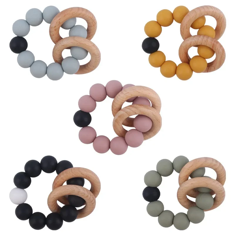 

Kissteether Custom Silicone Teether Beads Wooden Ring Bracelet Silicone Teething Toy Nursing Chew Toys Gift