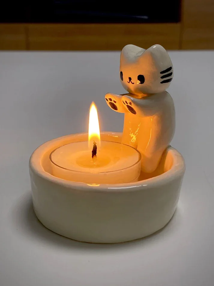 

Kitten Candle Holder Kitten Warming Its Paws