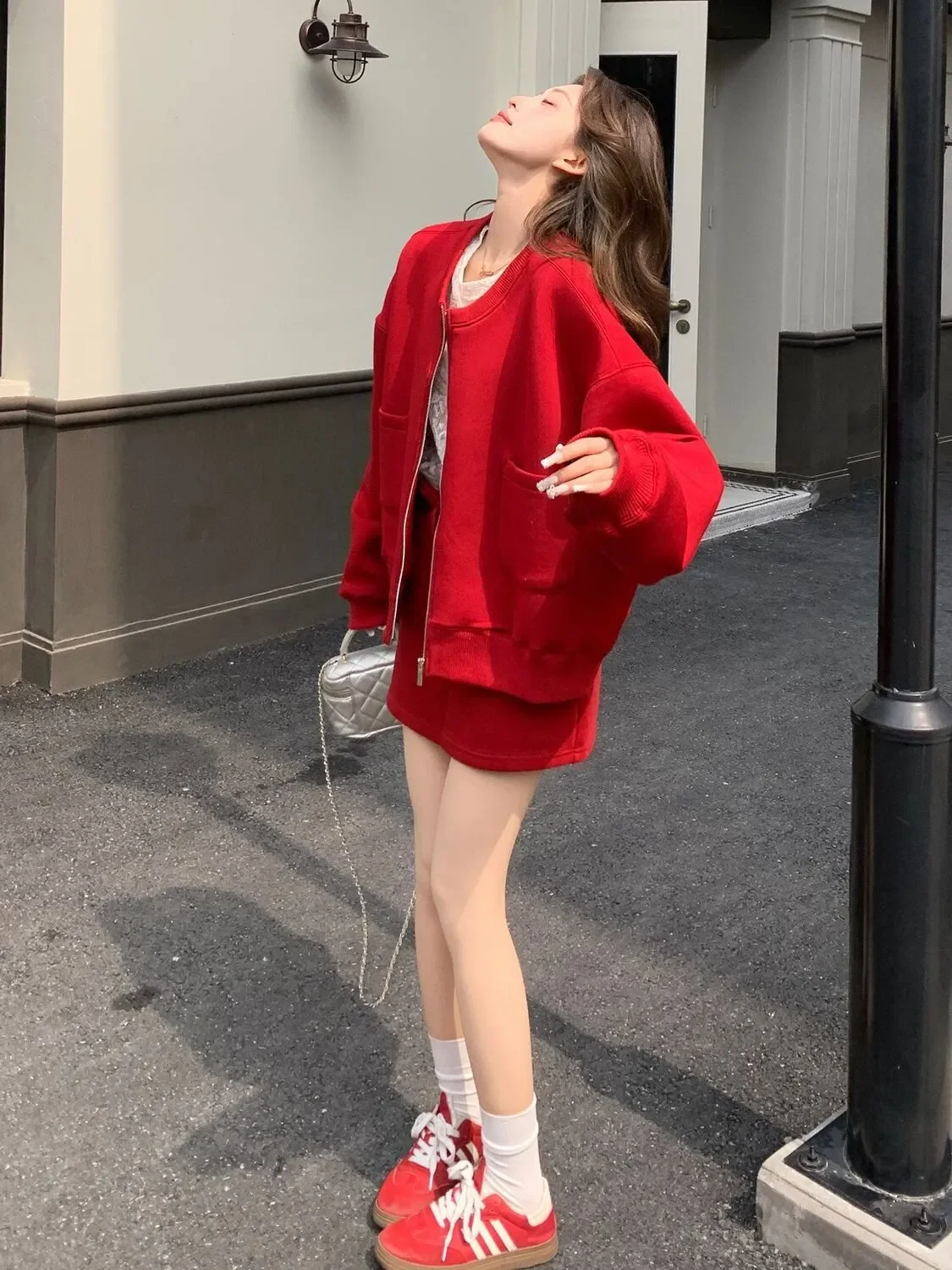 Spring and Autumn New Age Reducing Luxury Sports Set Women's Red Casual Top Short Skirt Two Piece Set