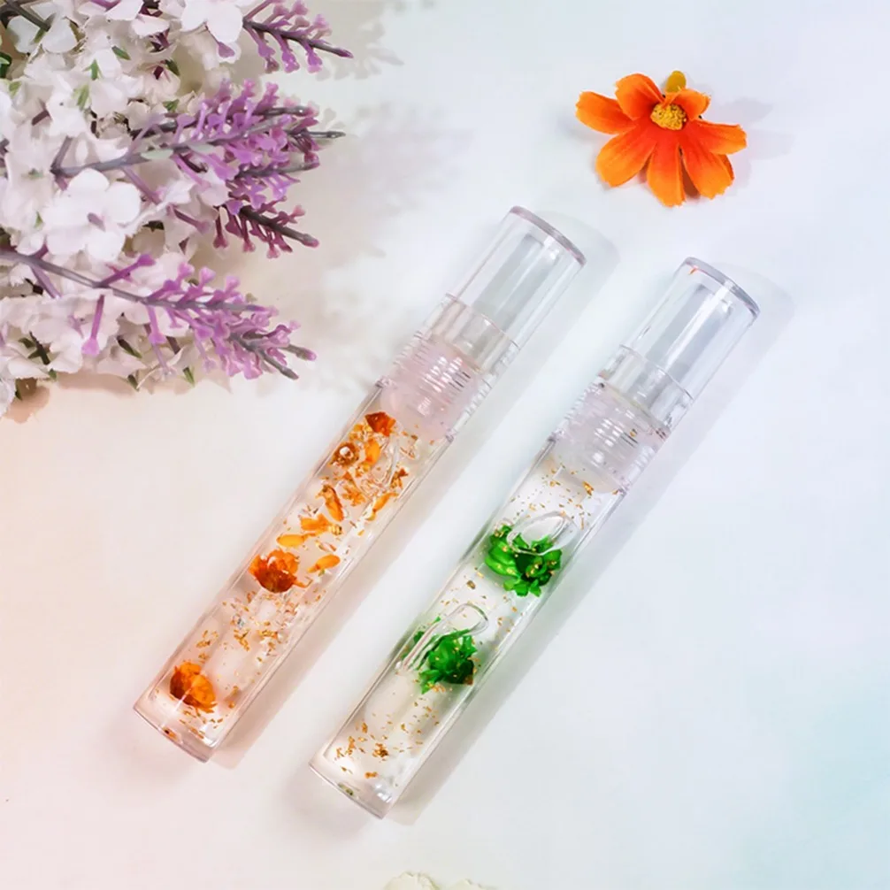 Huile à lèvres vegan à la fleur de marguerite, brillant transparent hydratant pour les lèvres sèches, marque privée, logo personnalisé, maquillage en gros, nourrit les lèvres, cosmétiques