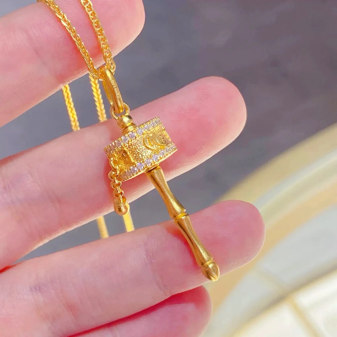 

Women's Rotating Gold Cylinder Pendant, 24K Gold, AU999 | Enameled bronze hues, rustic-luxury cultural symbolism.